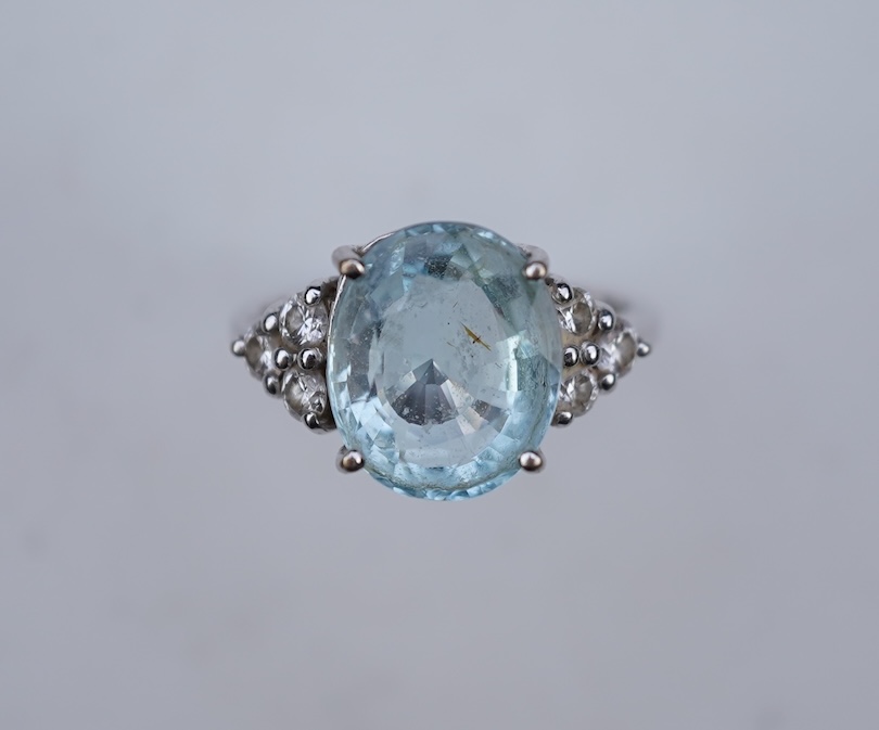 An aquamarine and diamond ring